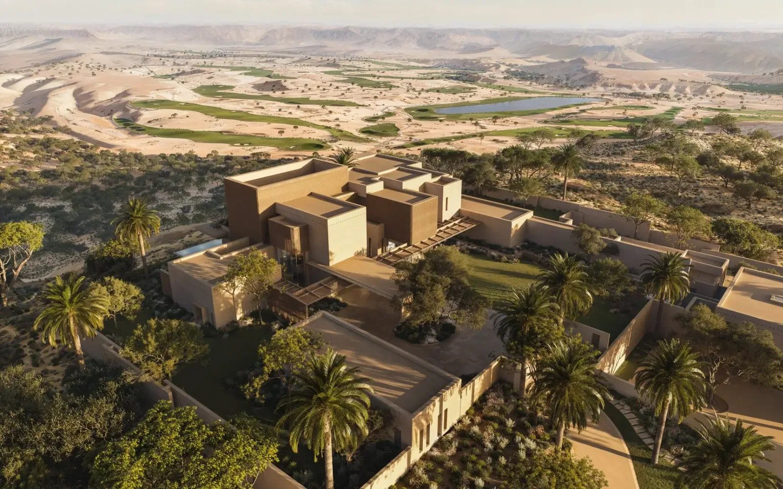 Aerial view of an Amansamar villa set within the desert landscape of Wadi Safar.