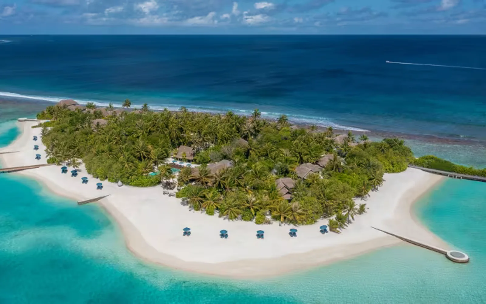 Naladhu Private Island Maldives in South Malé Atoll, official property photography.