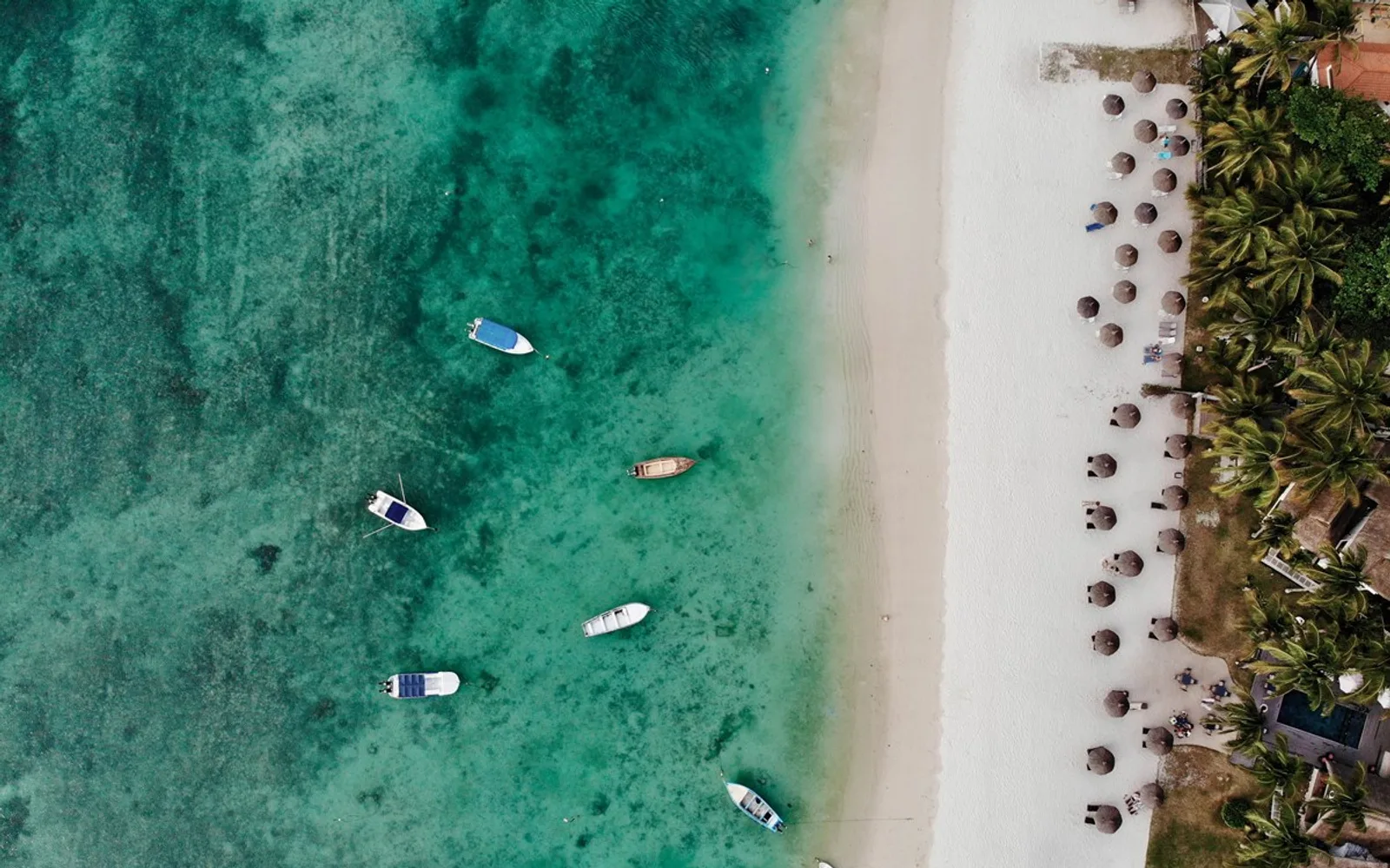 Constance Sakoa Boutik beside Trou aux Biches beach.