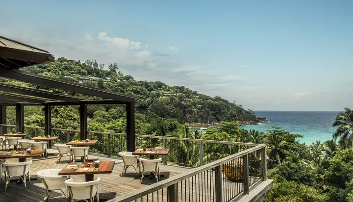 Outdoor dining terrace at ZEZ, Four Seasons Resort Seychelles