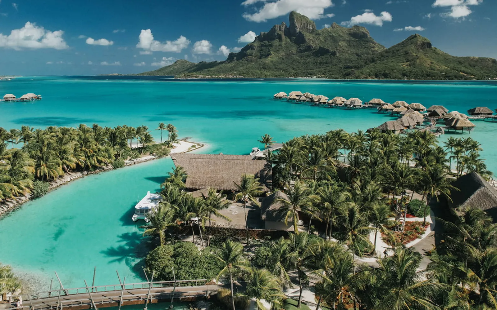 Four Seasons Resort Bora Bora, official Four Seasons photography for the hero section.