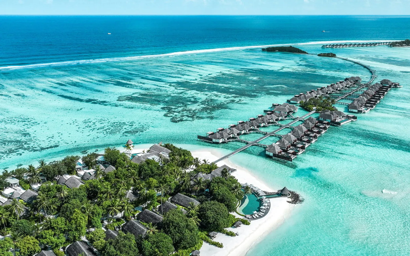 Four Seasons Resort Maldives at Kuda Huraa, official Four Seasons photography for the overview section.