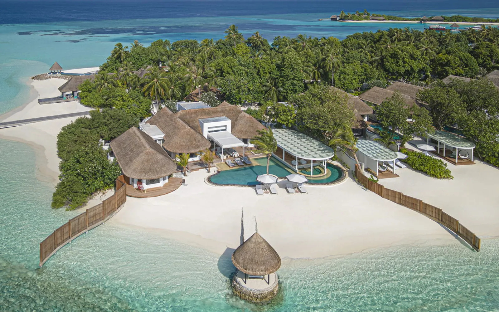 Four Seasons Resort Maldives at Kuda Huraa, official Four Seasons photography for the accommodation section.
