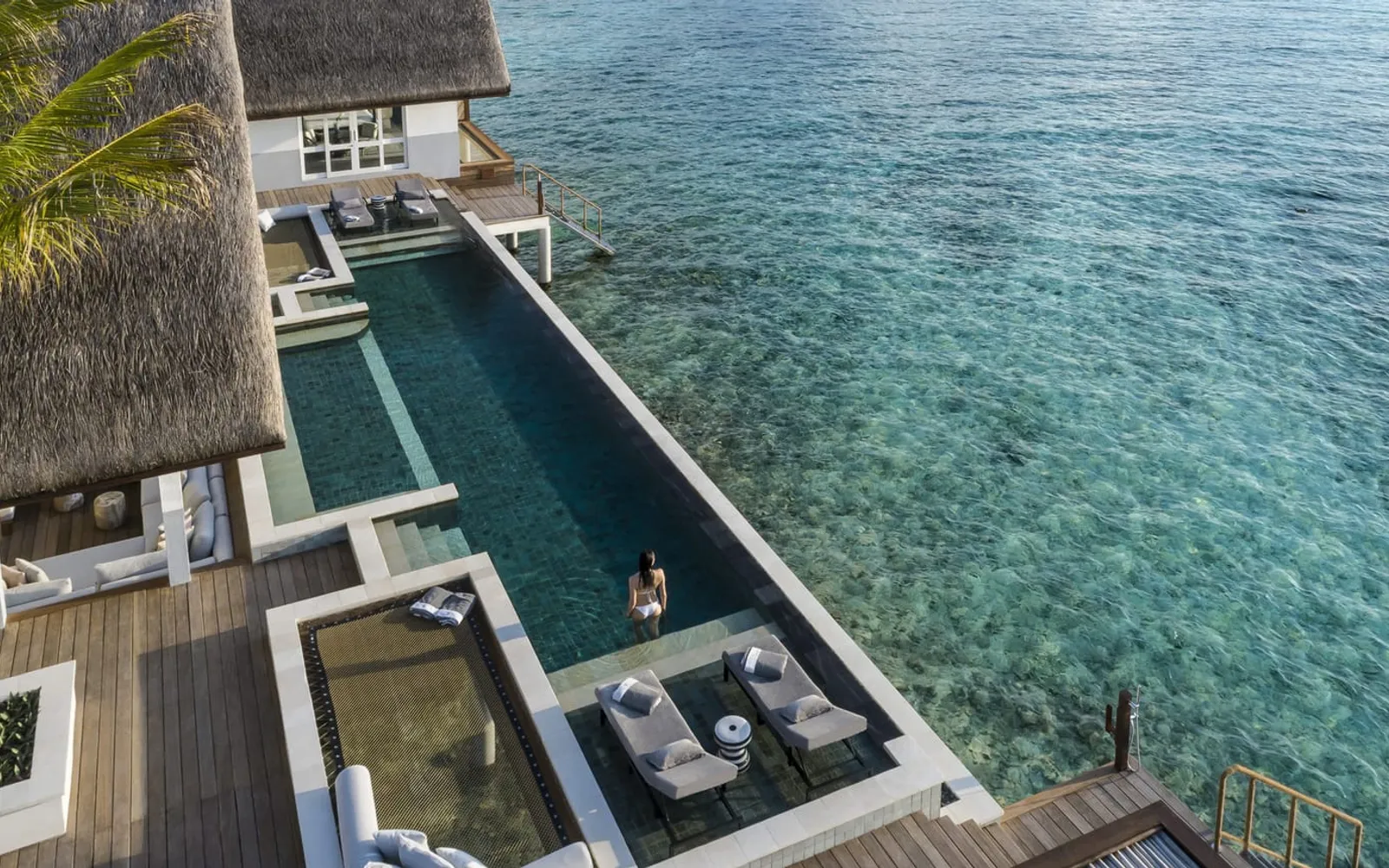 Four Seasons Resort Maldives at Landaa Giraavaru, official Four Seasons photography for the accommodation section.