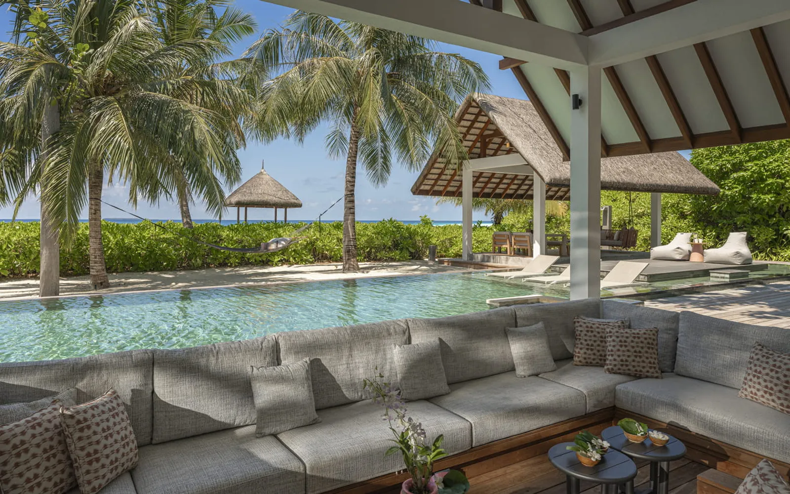 Four Seasons Resort Maldives at Landaa Giraavaru, official Four Seasons photography for the dining section.