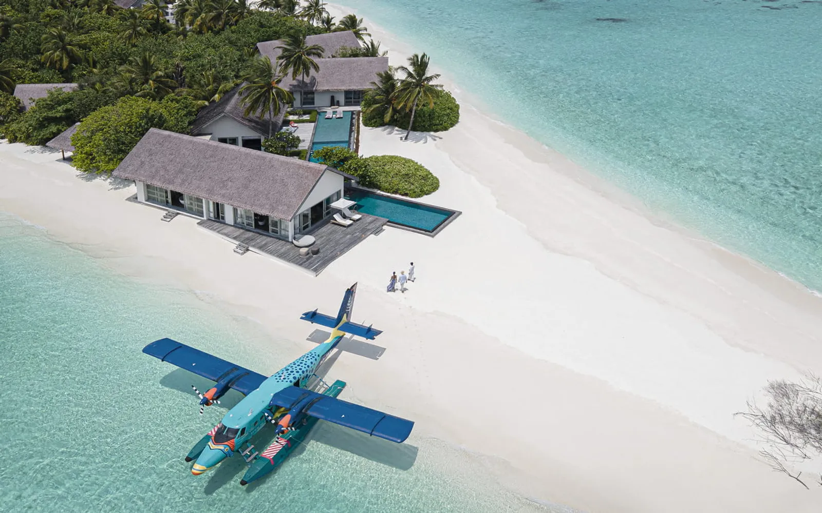 Four Seasons Private Island Maldives at Voavah, Baa Atoll, official Four Seasons photography for the hero section.