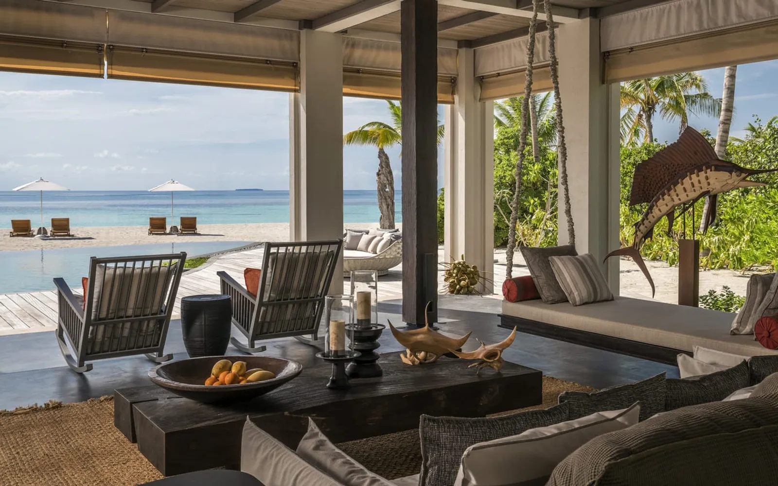 Four Seasons Private Island Maldives at Voavah, Baa Atoll, official Four Seasons photography for the dining section.