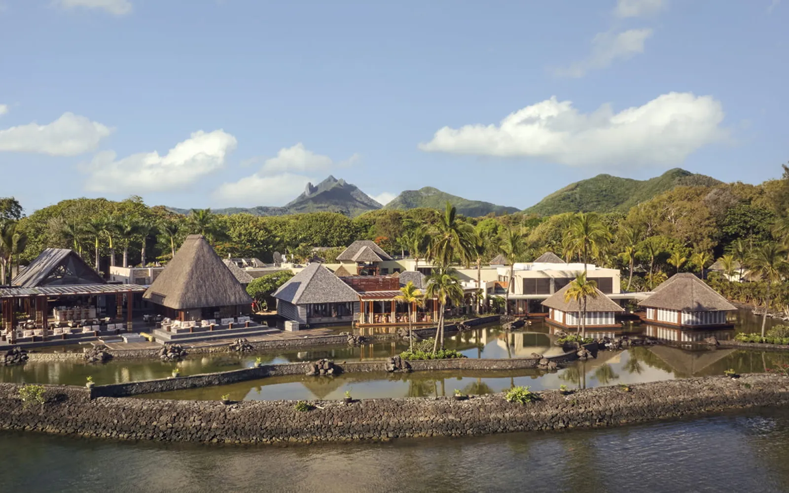 Four Seasons Resort Mauritius at Anahita, official Four Seasons photography for the hero section.