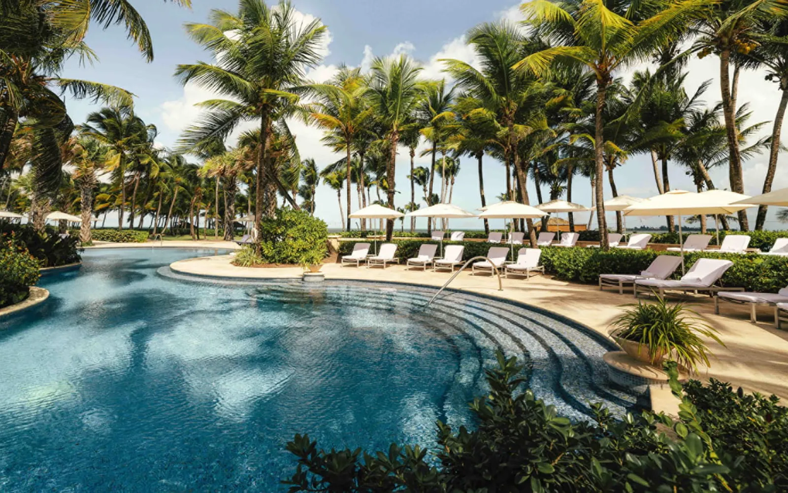 Four Seasons Resort and Residences Puerto Rico, official Four Seasons photography for the hero section.