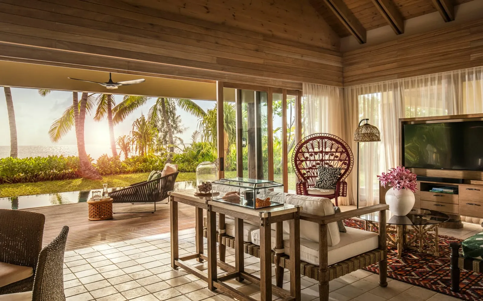 Four Seasons Resort Seychelles at Desroches Island, official Four Seasons photography for the dining section.
