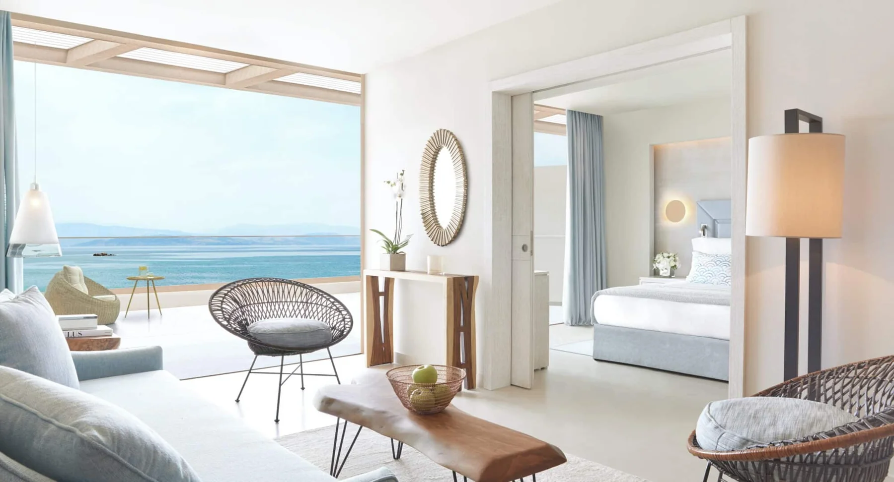Suite living area and sea-view terrace at Ikos Dassia