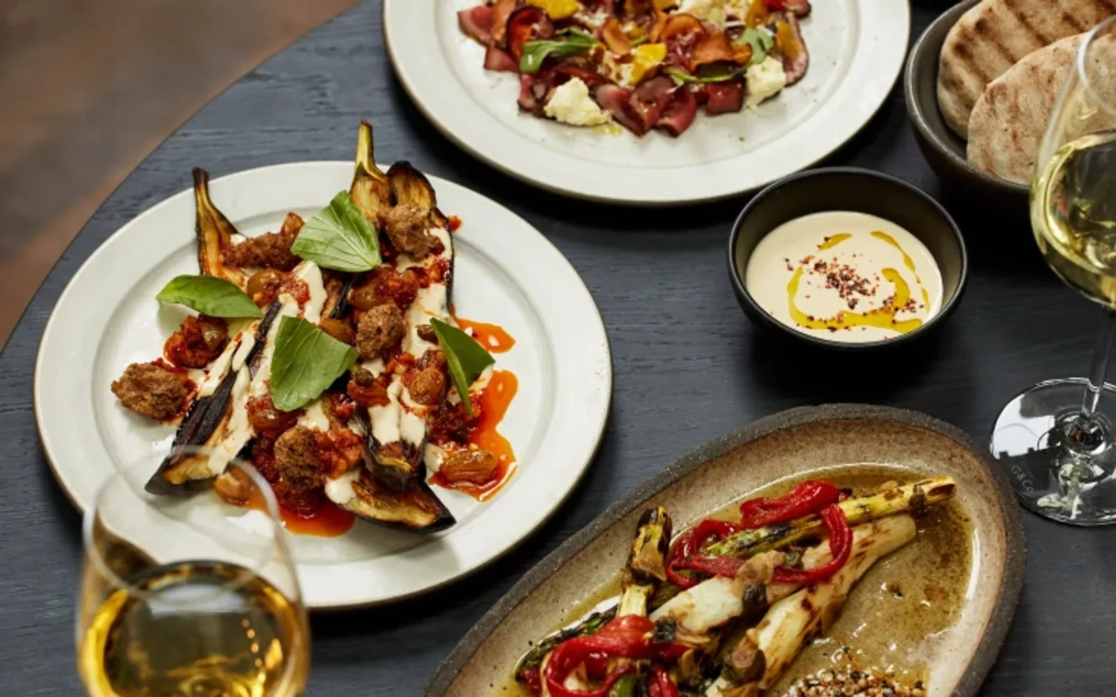 The Chard asparagus and Roasted aubergine from the small vegetarian menu at Ottolenghi Amsterdam, restaurant at Mandarin Oriental Conservatorium, Amsterdam.