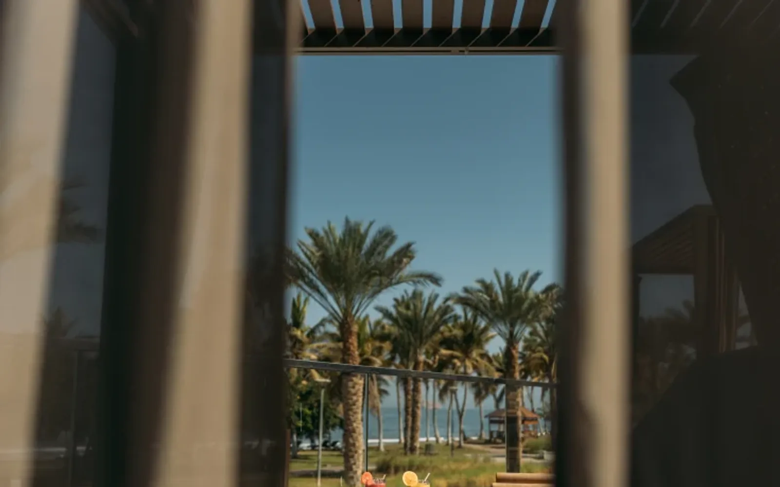 Poolside cabana with views of the sea.