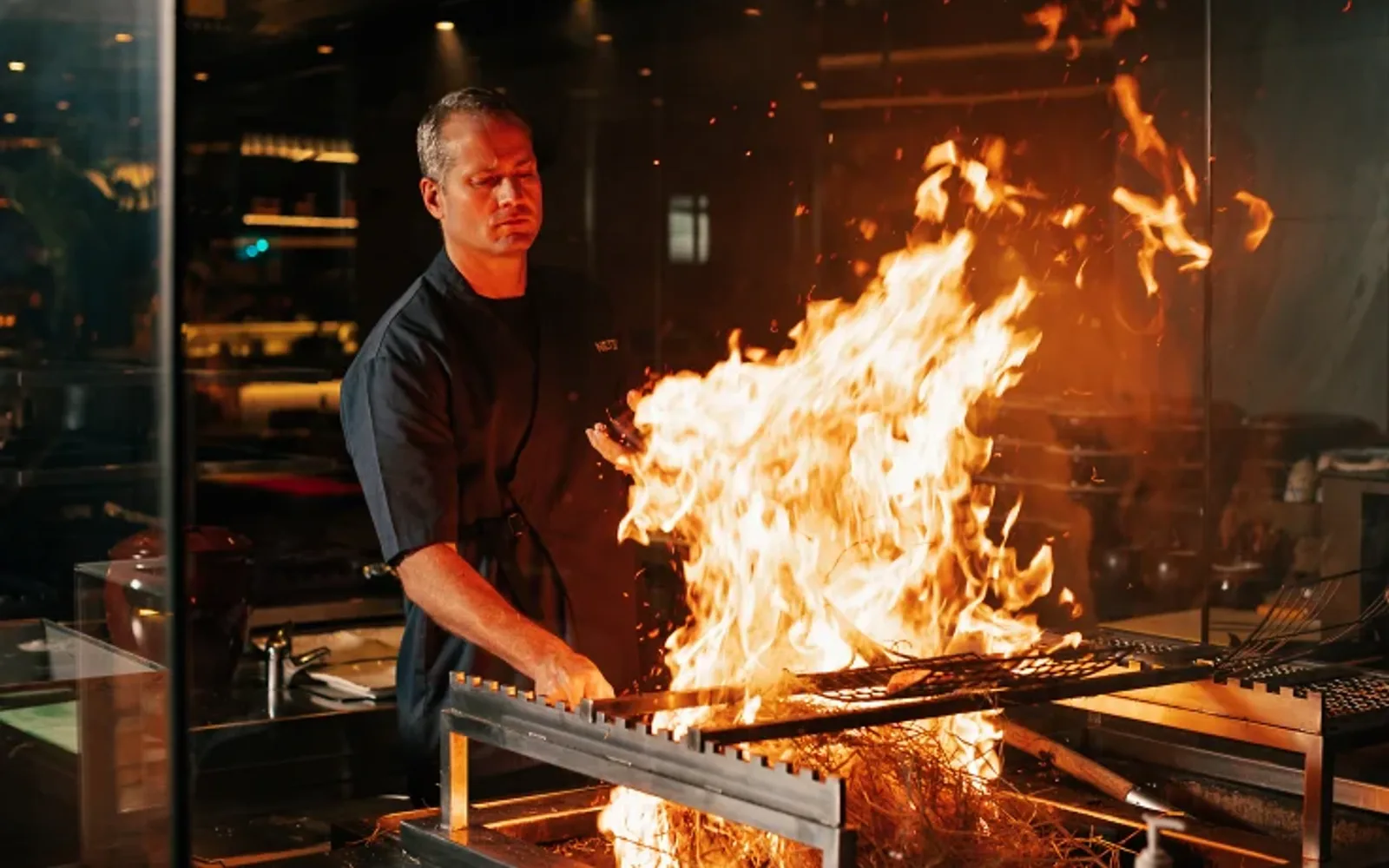 Chef Ross in fire action at Netsu Restaurant, Mandarin Oriental Jumeira, Dubai.