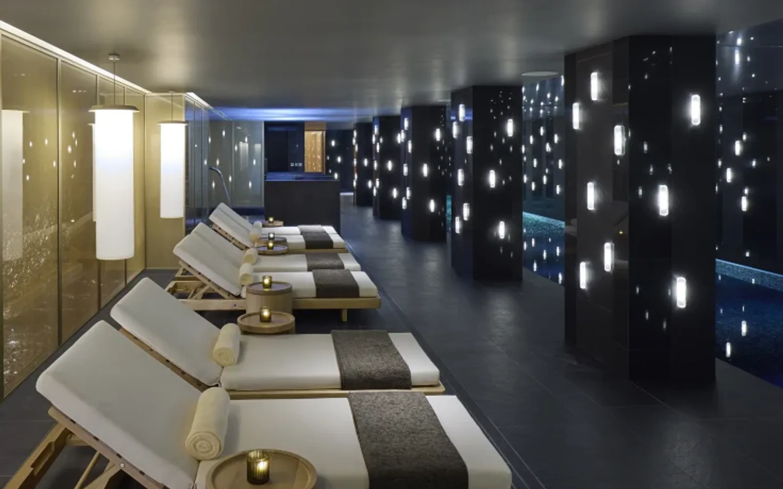Spa beds by the side of the pool.
