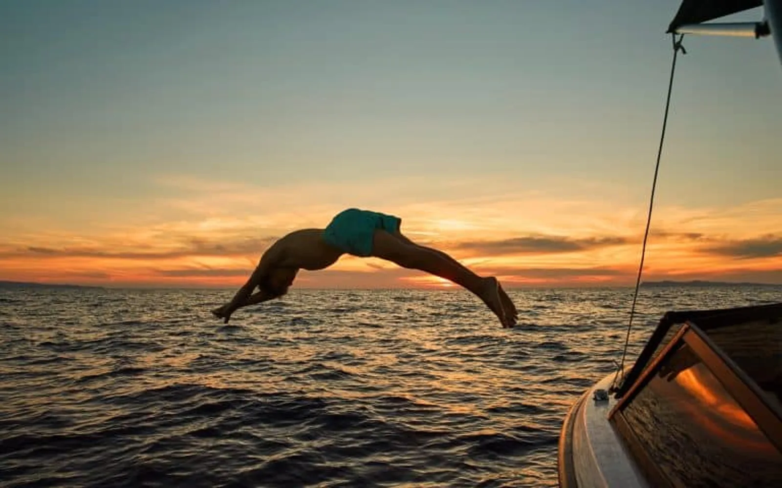 Sunset swimming in private beach at Nido