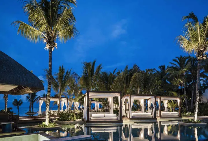 La Pointe pool at One&Only Le Saint Géran at dusk
