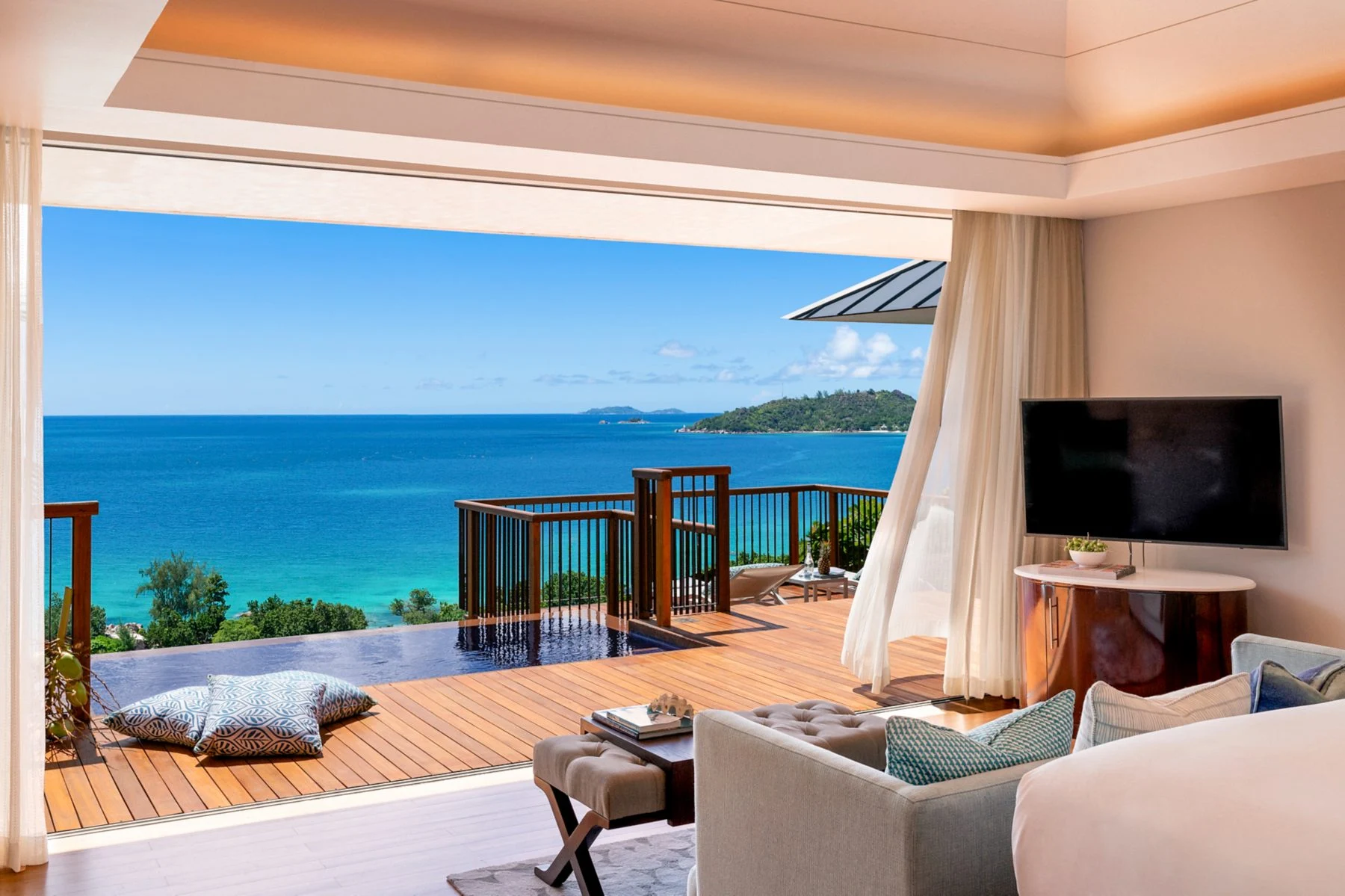 Villa living area and private pool at Raffles Seychelles