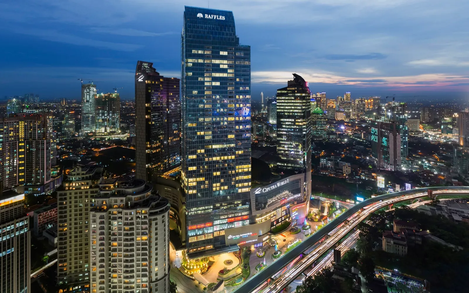 Raffles Jakarta exterior and city skyline