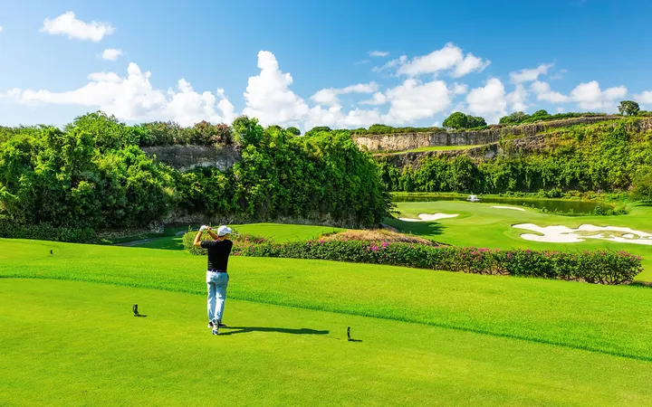 A golfer on a fairway at Sandy Lane, Barbados