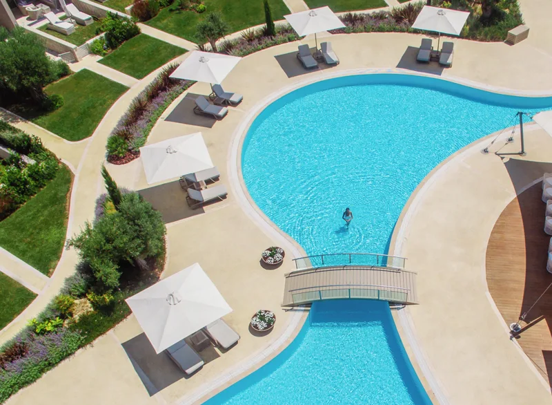 Aerial view of the lagoon-style pool at Sani Dunes