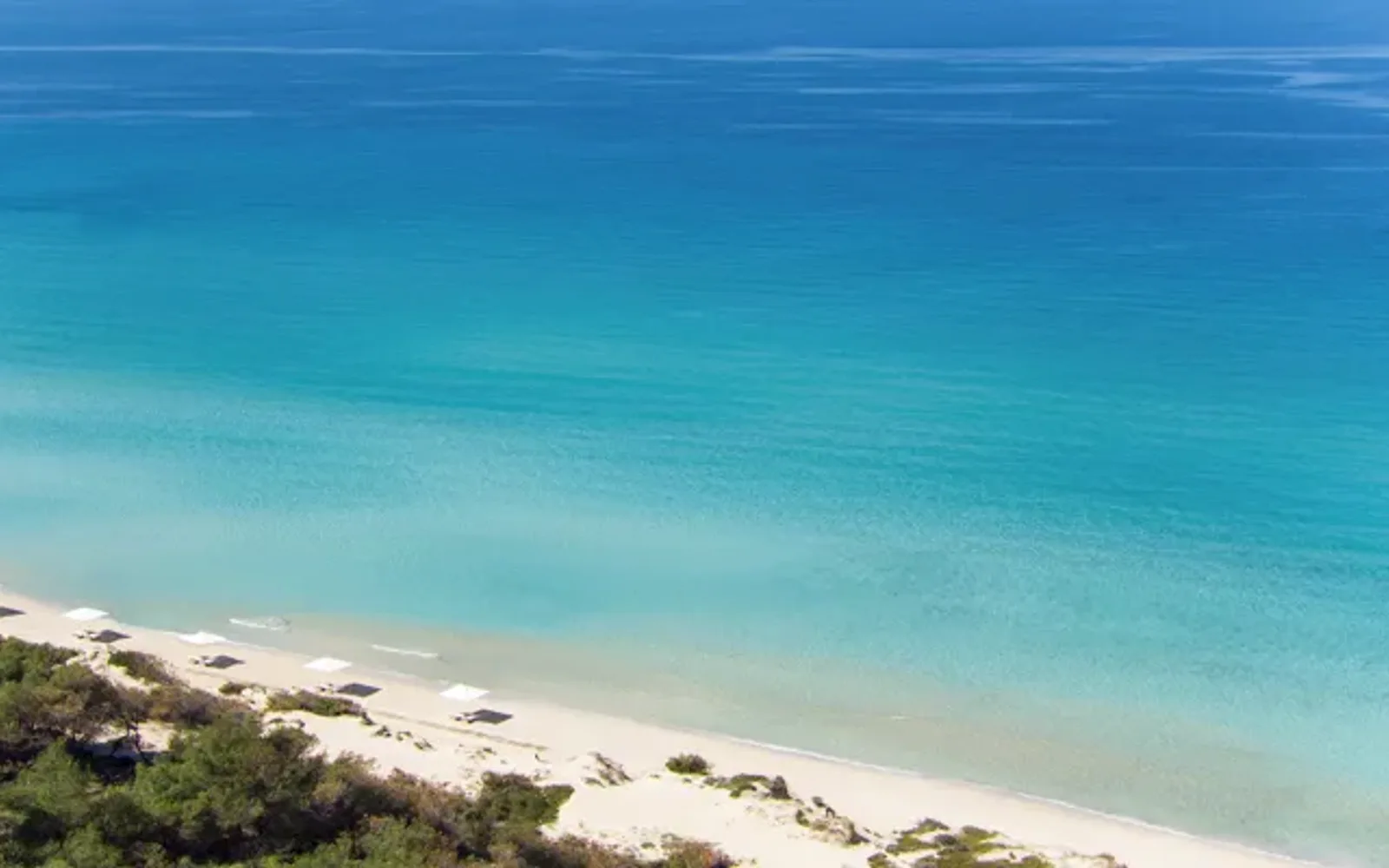 View of pools and beach at Sani Beach