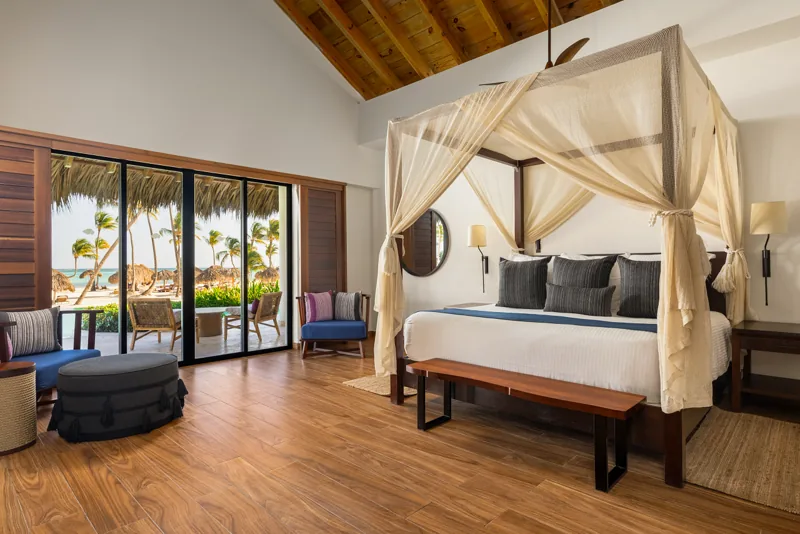 A Preferred Club bungalow bedroom at Secrets Cap Cana