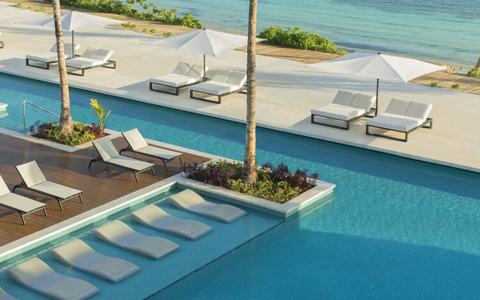 Main pool overlooking the Caribbean Sea at Excellence Oyster Bay
